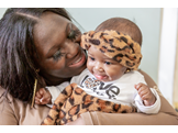 Talicia Williams holding her infant daughter Zahiri